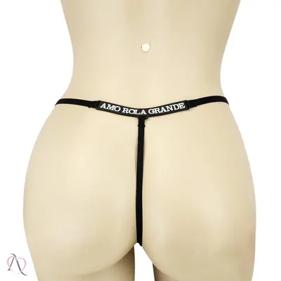 Calcinha com Frase que Brilha no Escuro AMO ROLA GRANDE Cor Preto - Tamanho Único