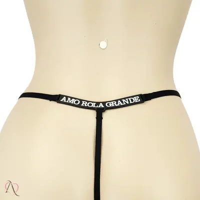 Calcinha com Frase que Brilha no Escuro AMO ROLA GRANDE Cor Preto - Tamanho Único