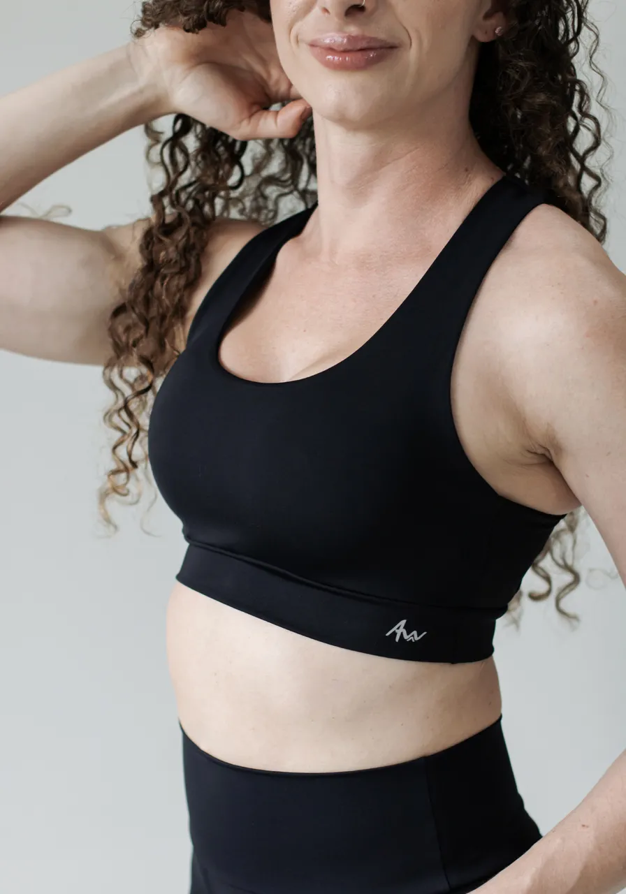 Top High Performance Ultra Black com bolso traseiro, alta sustentação, tecido duplo, secagem rápida e conforto