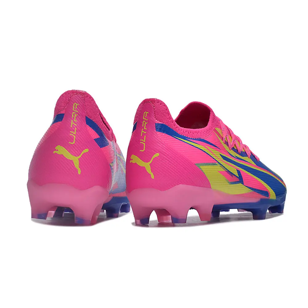 Chuteira Campo Puma Ultra Ultimate FG Rosa, Azul e Amarelo