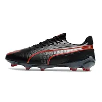 Chuteira Campo Puma King Ultimate FG Preta e Vermelha - imagem 1