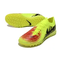 Chuteira Society Nike Phantom GX 2 Elite TF Amarelo, Vermelho e Preto - imagem 2