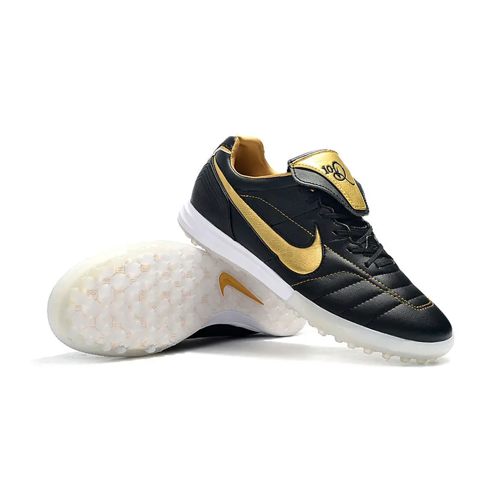 Chuteira Nike Retrô Tiempo Legend 7 Elite TF Preto e Dourado R10
