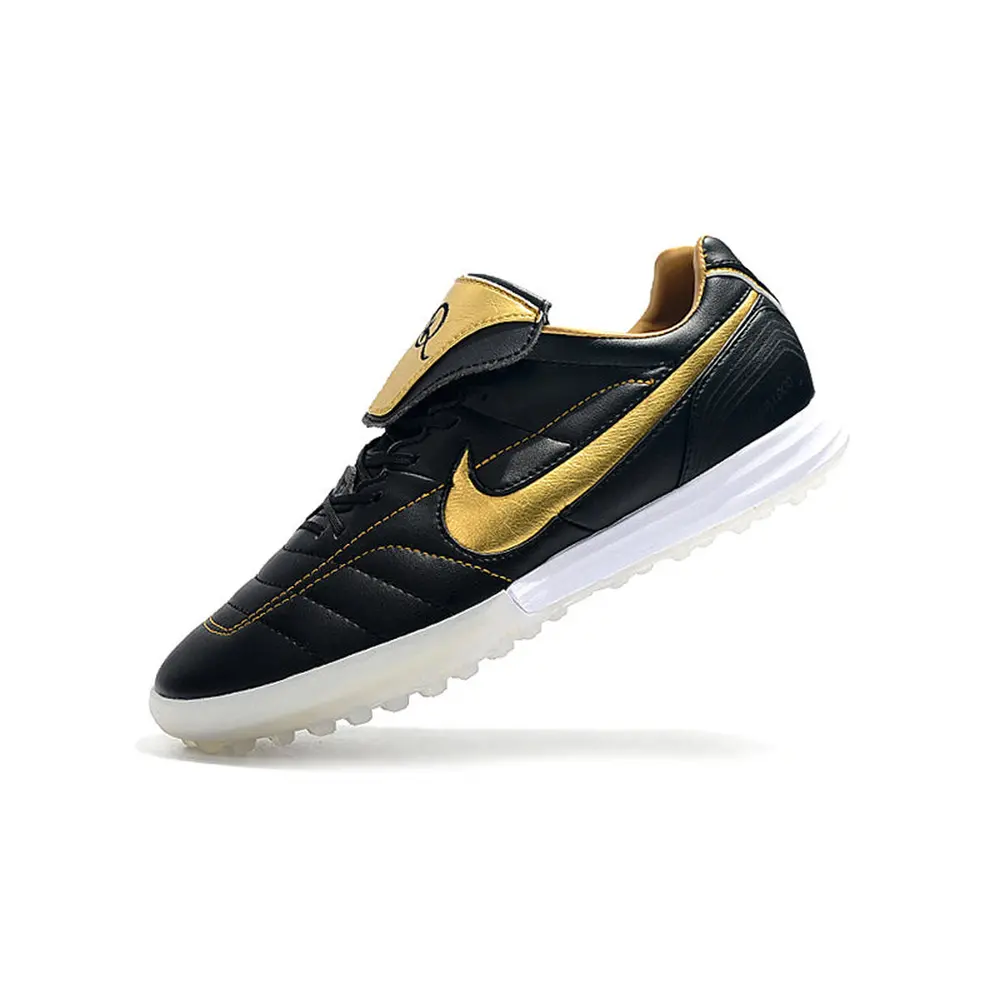 Chuteira Nike Retrô Tiempo Legend 7 Elite TF Preto e Dourado R10