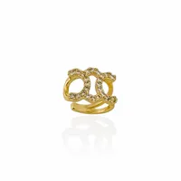 Piercing Folheado a Ouro 18k e Prata Inspiração Grandes Marcas Cravejado - imagem 1