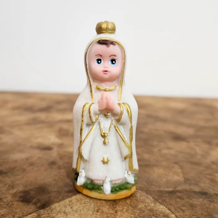 Imagem de Nossa Senhora de Fátima Infantil de Resina - 8 cm | Comprar na Lojinha Uai