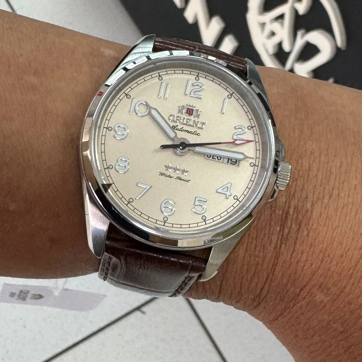 Relógio Orient Automático Elegance YN6SC006 Champanhe | Taniguchi