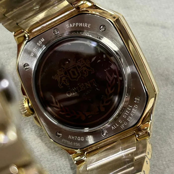 Relógio Orient Automático Skeleton NH7GG008 Dourado Safira