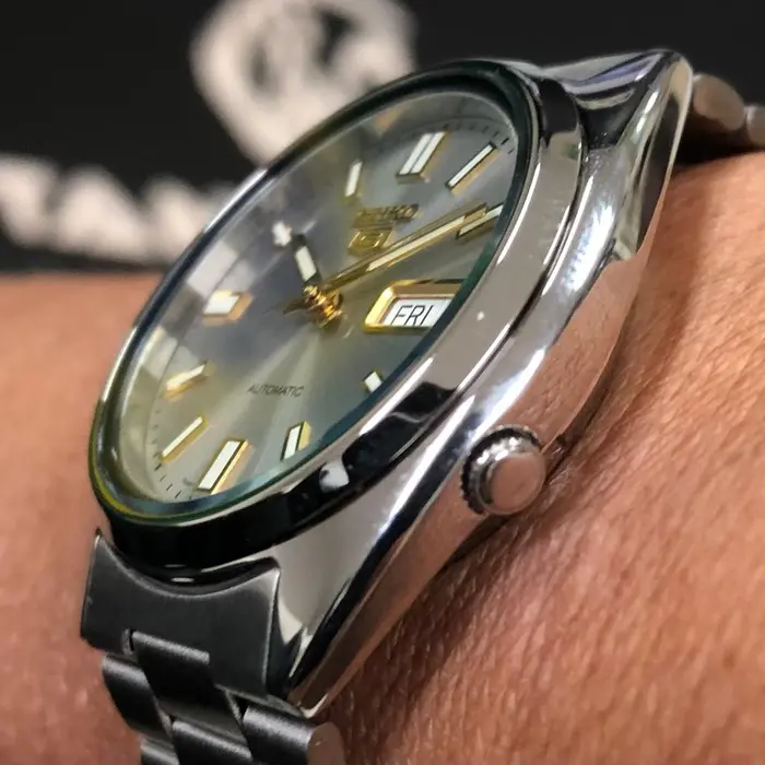 Relógio Seiko 5 Automatic SNXS75 Cinza e Dourado | Taniguchi Relógios