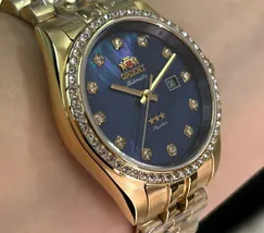 Relógio Orient 3 Estrelas NH5GG001 Dourado Automático Hacking | Taniguchi Relógios - imagem 3