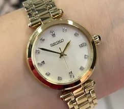 Relógio Seiko Feminino SRZ536P1 Dourado Diamantes Safira Original | Taniguchi Relógios - imagem 1