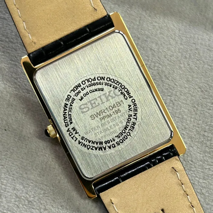 Relógio Seiko Essentials Tank SWR104B1 Dourado Safira Original | Taniguchi Relógios
