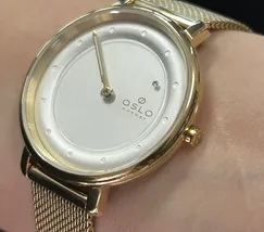Relógio Oslo Slim Feminino OFGSSS9T0015 Dourado Safira Original | Taniguchi Relógios - imagem 4