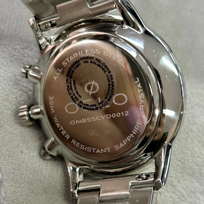 Relógio Oslo Masculino Cronógrafo OMBSSCVD0012 Safira Prata Original | Taniguchi Relógios