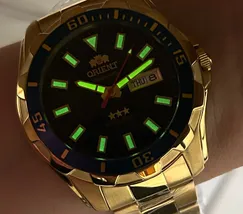 Relógio Orient 3 Estrelas Automático NH36 469GP078NH Dourado Azul 47mm 100m | Taniguchi Relógios - imagem 5