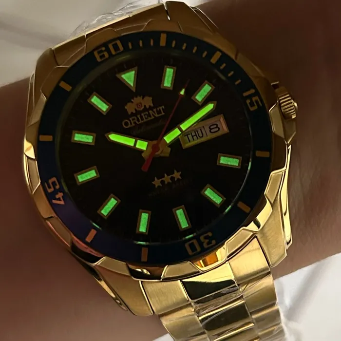 Relógio Orient 3 Estrelas Automático NH36 469GP078NH Dourado Azul 47mm 100m | Taniguchi Relógios
