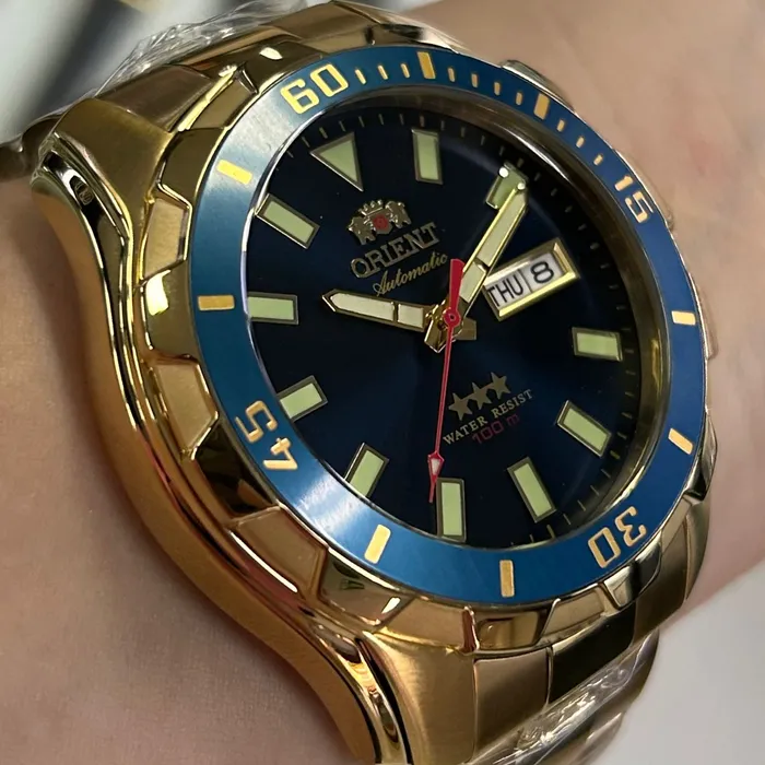 Relógio Orient 3 Estrelas Automático NH36 469GP078NH Dourado Azul 47mm 100m | Taniguchi Relógios