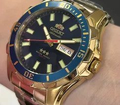 Relógio Orient 3 Estrelas Automático NH36 469GP078NH Dourado Azul 47mm 100m | Taniguchi Relógios - imagem 3