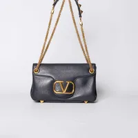 Valentino Garavani Vlogo  - imagem 5