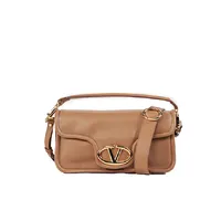 Valentino Garavani Vlogo 1960  - imagem 1